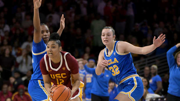 UCLA Bruins guard Charisma Osborne and forward Angela Dugalic USC Trojans guard JuJu Watkins women's basketball